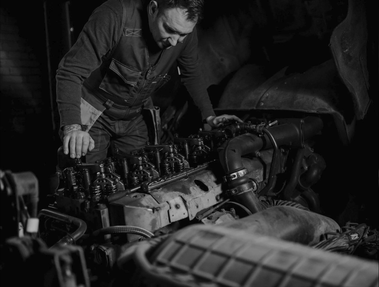 GMS mechanic servicing a diesel engine